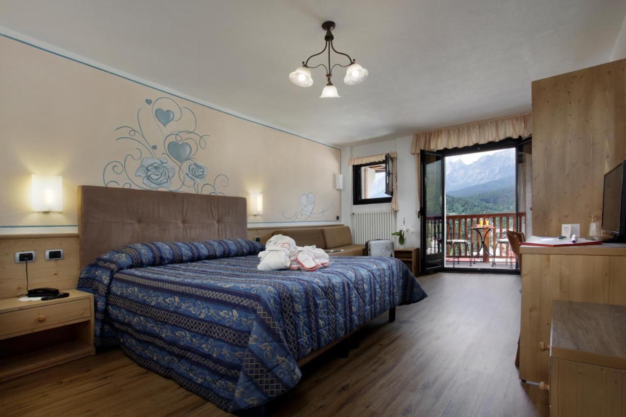 Cavallino Lovely Hotel Andalo Bagian luar foto